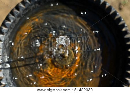 Water Flowing From A Faucet