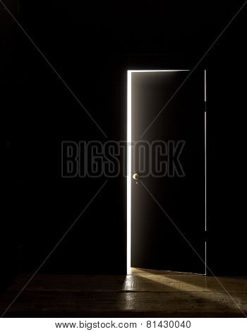 DARKENED ROOM DOOR SLIGHTLY OPEN
