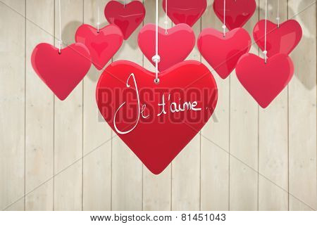 Valentines love hearts against wooden planks