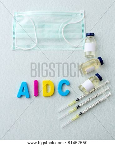 Medicines with word Aids on light background
