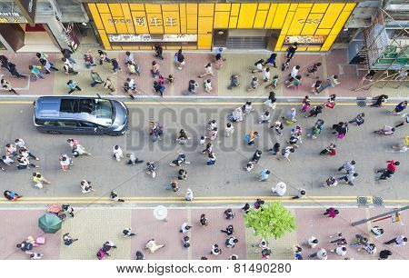 Pedestrians walking on a street, high angle view