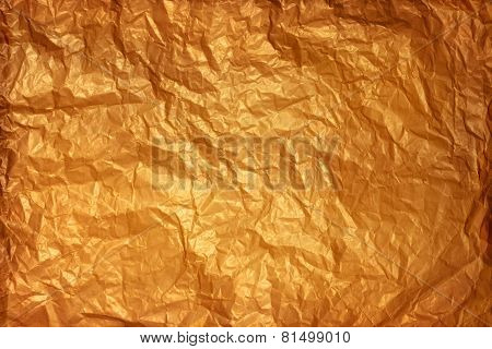 Old crumpled paper texture of warm colors.
