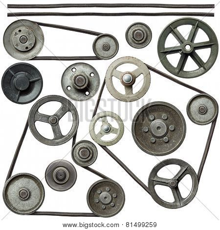 Old metal pulleys with belt.