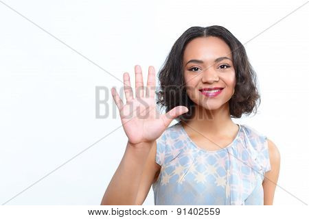 Beautiful  girl standing with palm up