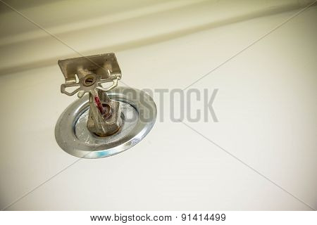 Old Sprinkler System On The Wall Of Hotel
