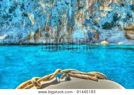 Boat Reaching The Rocky Coast In Orosei Gulf
