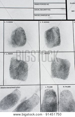 Fingerprint on police fingerprint card.