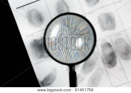Fingerprint on police fingerprint card.