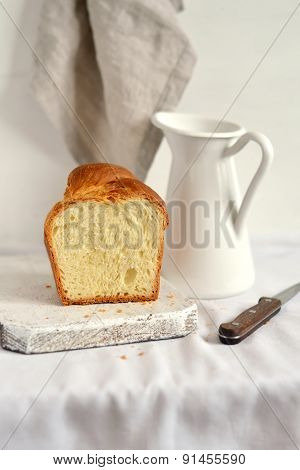 Fresh Butter Bread On A Light Surface