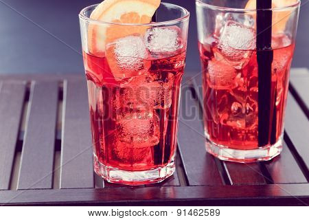 Spritz Aperitif Aperol Cocktail With Two Orange Slices And Ice Cubes Vintage Style