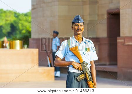Soldier In Parade Uniform Guards The Indian Gate