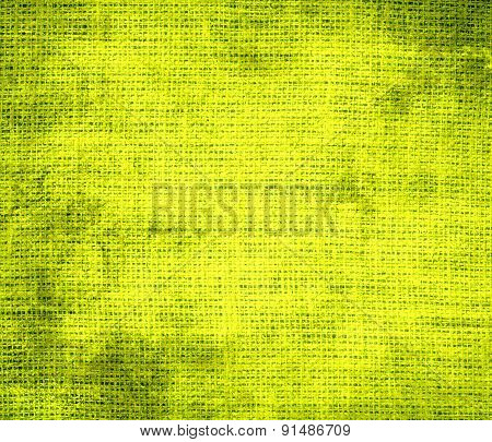 Grunge background of chartreuse (traditional) burlap texture
