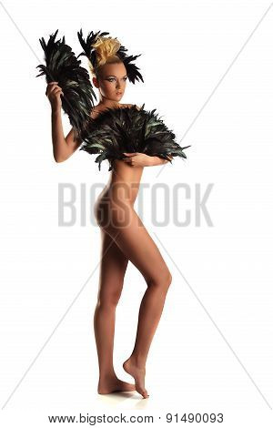 Portrait of woman shaman with raven feather in her hair