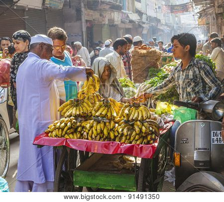Man Sells Bananas At The Old Vegetable Street Market In Delhi