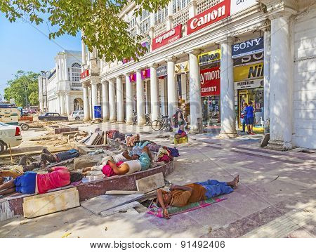Construction Workers Relax At The Connaught Place
