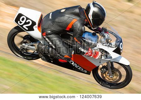 BROADFORD VICTORIA/AUSTRALIA - APRIL 1 2016: Classic bikes practice at Broadford Racetrack before the 2016 Shannons Victorian Historic Road Racing Championship.