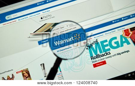 MONTREAL CANADA - MARCH 25 2016 - Walmart internet page under magnifying glass. Walmart is an American multinational retail corporation that operates a chain of hypermarkets