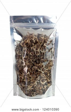 Dried Moringa Seeds in packaging foil zip lock bag. Isolated on white with clipping paths. food ingredient. Substitute drug treatment for skin hydration.