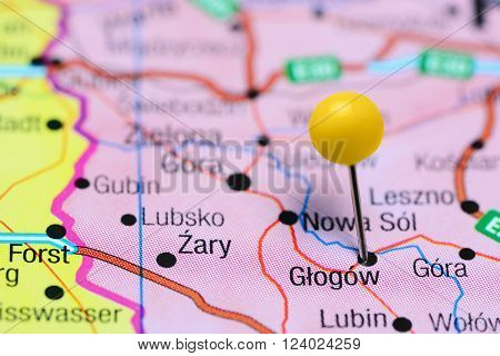 Photo of pinned Glogow on a map of Poland. May be used as illustration for traveling theme.