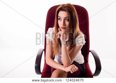 beautiful business lady thinking about something and looks away