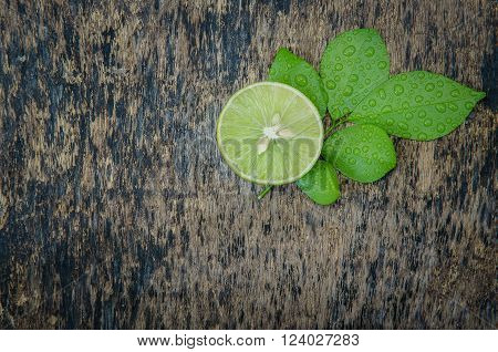 Lemon on old wooden background: still life.
** Note: Soft Focus at 100%, best at smaller sizes