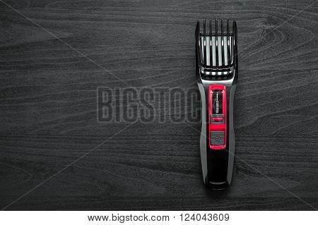 hair trimmer closeup on a black background
