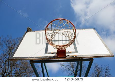 Picture of a basketball field goal with the sky in background.
** Note: Visible grain at 100%, best at smaller sizes