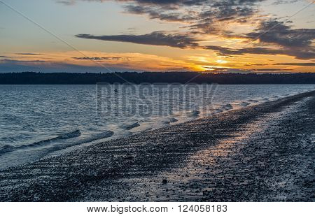 A view of a sunset from Three Tree Point in Burien Washington.