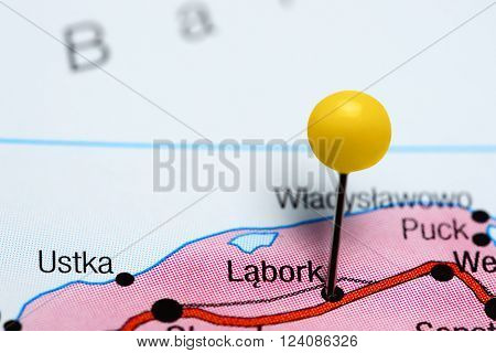 Photo of pinned Lebork on a map of Poland. May be used as illustration for traveling theme.