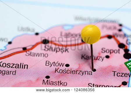 Photo of pinned Koscierzyna on a map of Poland. May be used as illustration for traveling theme.