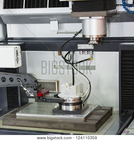 operator use graphite EDM electrod to make precision mold and die