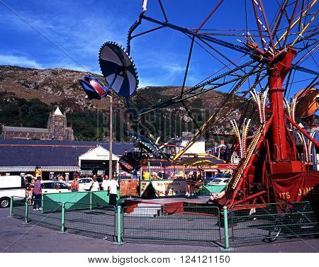 BARMOUTH, UK - AUGUST 6, 1995 - Paratrooper fairground ride along the seafront Barmouth Gwyedd Wales UK Western Europe, August 6, 1995.
