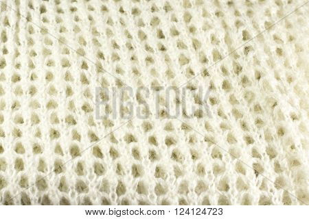 knitted woolen fabric close up as background
