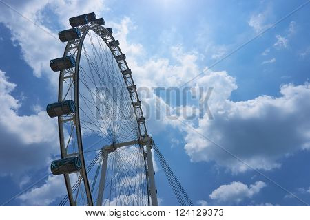 Singapore, Singapore - April 2, 2015: Ferris wheel Singapore Flyer at Marina Bay. The Flyer has an overall height of 165 metres and was opened in 2008.