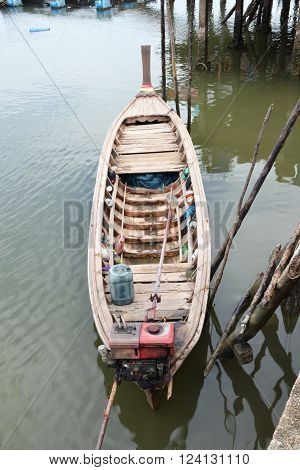 long tail boat for fishing of fisherman family