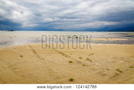 Beach at Poso lake near Tentena. Central Sulawesi. Indonesia