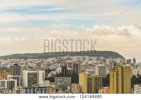 QUITO, ECUADOR - OCTOBER - 2015 - Cityscape aerial view of Quito from the top of San Juan Basilica church.