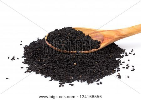 Heap Of Black Sesame On Wooden Spoon
