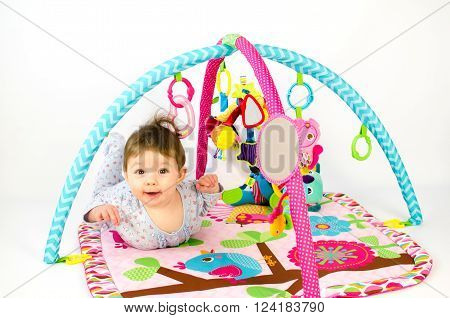 Baby Girl Palying In An Activity Gym