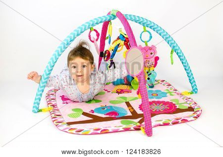 Baby Girl Palying In An Activity Gym