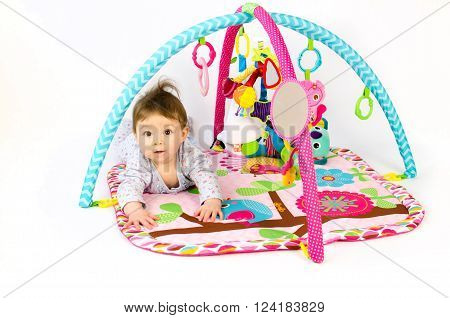 Baby Girl Palying In An Activity Gym
