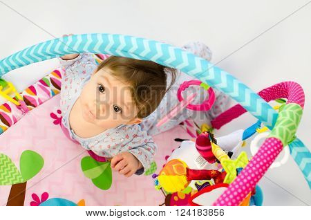 Baby Girl Palying In An Activity Gym