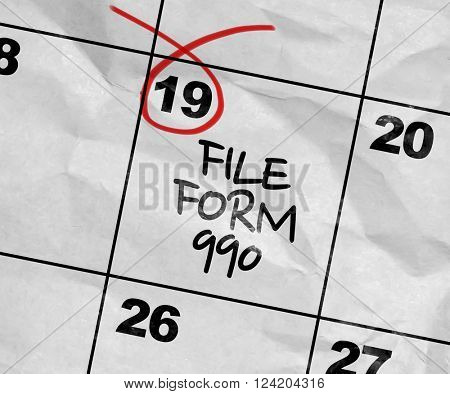 Concept image of a Calendar with the text: File Form 990