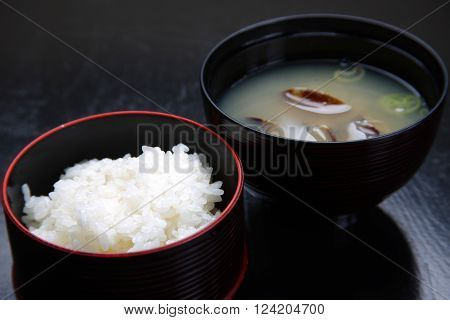 close up shot of boiled rice and miso soup