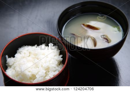 close up shot of boiled rice and miso soup
