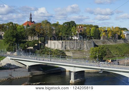 NARVA, ESTONIA - SEPTEMBER 27, 2015: The border bridge between Estonia and Russia on the background of the city of Narva. The landmark of Narva