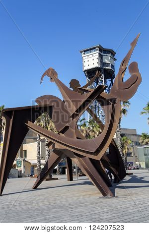 SPAIN, BARCELONA, JUNE, 27, 2015 - Sculpture Homenaje a la natación (Tribute to the swimming - 2004) by Alfredo Lenz on Placa del Mar in Barcelona, Catalonia, Spain.