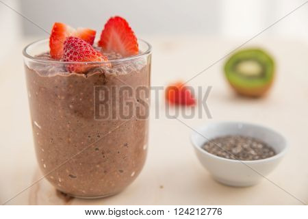 Healthy vegan chocolate chia pudding with berries