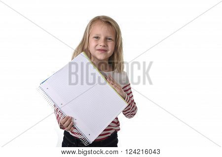 sweet beautiful female child 6 to 8 years old with cute blonde hair and blue eyes holding notebook or notepad isolated on white in education and primary or junior school supplies concept