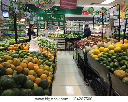 Hanoi, Vietnam - Apr 4, 2016: Many kind of fruits and vegetables being displayed for sale at a Vinmart supermarket. Vinmart is and retailer brand of Vingroup - a biggest Vietnamese corporation.